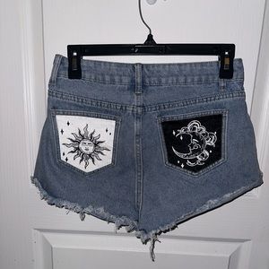 Shein brand shorts with moon and sun pattern on back pockets